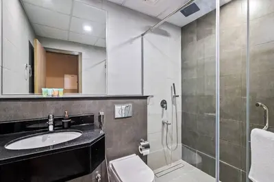 a bathroom with a sink and a shower at Peacefull Studio - Arjan in Dubai