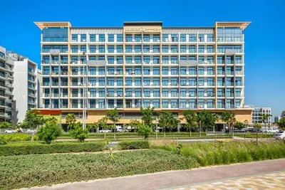 a large building with a lot of windows at Peacefull Studio - Arjan in Dubai