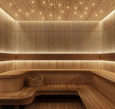 a sauna with a wooden bench and lights on the ceiling at Stonetree - Brand New Studio - Prime Location in Dubai
