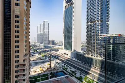 an aerial view of a city with tall buildings at Cozy Studio in JLT I Medore in Dubai