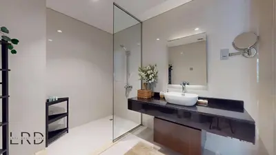 a bathroom with a sink and a mirror at Luxury Studio in Business Bay in Dubai