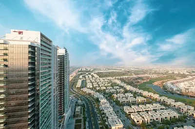 an aerial view of a city with tall buildings at SmartStay at Carson Tower - Panoramic City Views - Modern Luxury Apartments in Dubai
