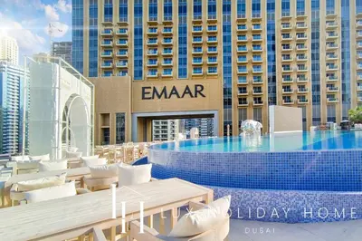 a resort with a swimming pool and a hotel at LUX The JW Marina Suite 2 in Dubai