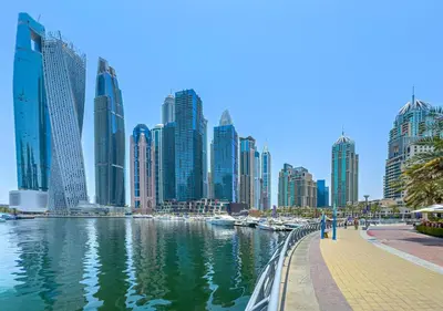 a view of a city with a river and buildings at 2BR Dubai Marina Apt - Walk to Metro - Pool and Gym in Dubai