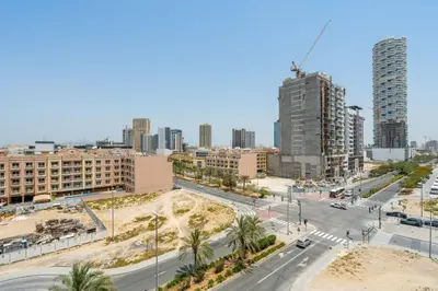 an aerial view of a city with tall buildings at GuestReady - Charming haven at Binghatti Crest in Dubai