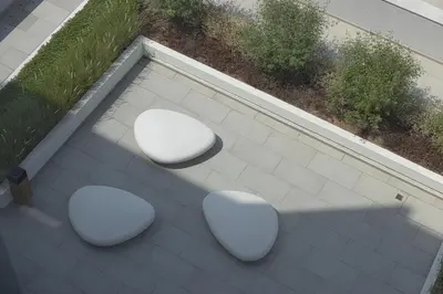 two white chairs sitting on top of a patio at Crystal Lagoon View Beach access Fast Wi-Fi in Dubai