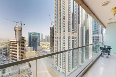 a balcony with a view of a city at Ocean Heights - Exquisite One Bedroom in Dubai