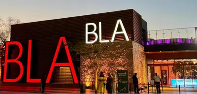 a large sign on the side of a building at Best Spot in Marina Dubai in Dubai