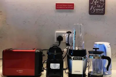 a counter with a blender and other appliances on it at Full Seaview Comfortable Apt La Mer Dubai in Dubai