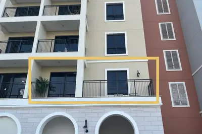 an apartment building with balconies on the side of it at Full Seaview Comfortable Apt La Mer Dubai in Dubai