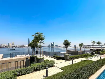 a view of a body of water with a city at Elegant 1 bedroom in Creek Edge in Dubai