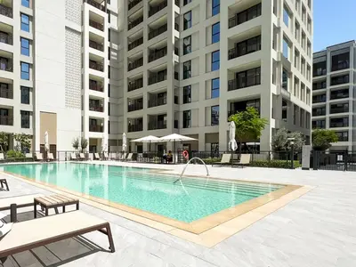 an image of a swimming pool in a building at Elegant at Creek Beach 1 BHK in Dubai