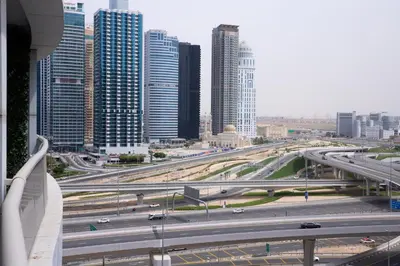 a view of a highway in a city with tall buildings at Dubai Marina - Modern Design Studio Apartment, Marina Diamond 2 in Dubai