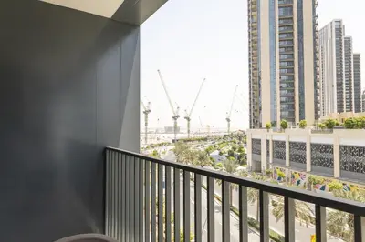 a balcony with a view of a city at Elegant 1 bedroom in Creek Edge in Dubai