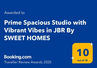 a screenshot of the prime spreckels studio with different videos in jbr at Prime Spacious Studio with Vibrant Vibes in JBR By SWEET HOMES in Dubai