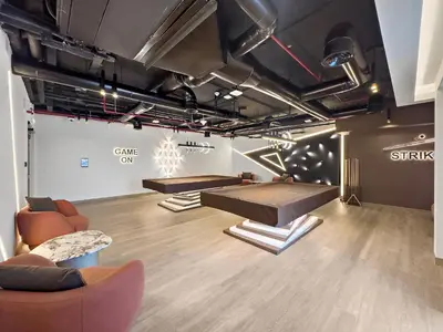 a room with couches and a table in a room at Big Studio - WOW facilities in Dubai