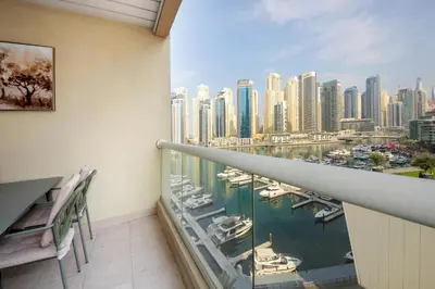 a balcony with a view of a city at Stunning Marina view apartment In Marina sail tower by Truebleu vacation homes in Dubai