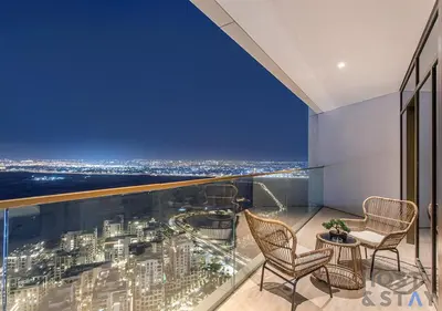 a room with a view of a city at 2-BR Getaway at Palace Residences, Dubai Creek in Dubai