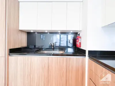 a kitchen with a sink and a counter top at Stylish One-Bedroom Getaway in Business Bay in Dubai