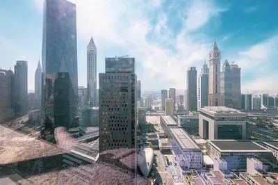 a view of a large city with tall buildings at Heart of DIFC 1 BR LUX - Exceptional View in Dubai