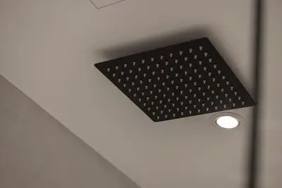a light on the ceiling of a room at Heart of DIFC 1 BR LUX - Exceptional View in Dubai