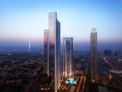 a city skyline with tall skyscrapers at night at Top Floor Urban Oasis Steps from Dubai Mall - 1BR Apartment in Downtown Views ll, Tower 1 in Dubai