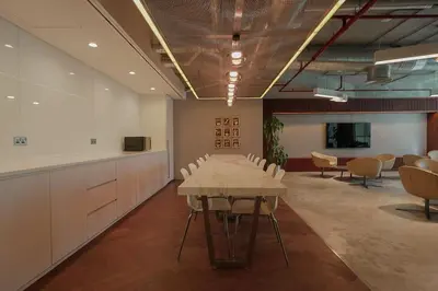 a conference room with a table and chairs in it at Dubai Modern Apartment l Sleeps 4 l 2 Baths in Dubai