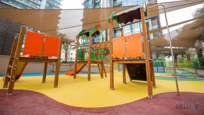 a playground with a slide in a building at Chic 1BR in The Residence at Marina Gate 2, Dubai Marina by Deluxe Holiday Homes in Dubai