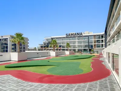 a miniature golf course on the side of a building at Cozy Studio with sun terrace in Dubai