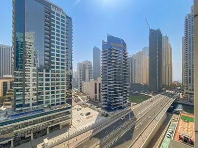 an aerial view of a city with tall buildings at StoneTree - Newly Furnished - Near Metro in Dubai