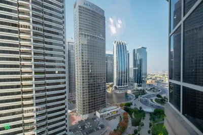 an aerial view of a city with tall buildings at Clever Guest 025 Dubai Gate 1 in Dubai