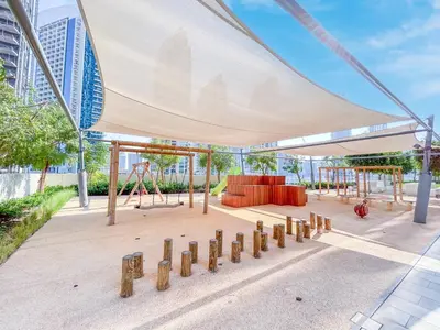 a pavilion with a playground with a swing at Stunning Renovated Home with Full Burj Khalifa View in Dubai