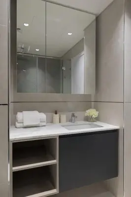 a bathroom with a sink and a mirror at Cozy Studio in Westwood By IMTIAZ in Dubai
