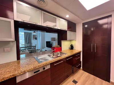 a kitchen with a sink and a counter top at Luxurious 1BR in Burj Views Podium, Downtown in Dubai
