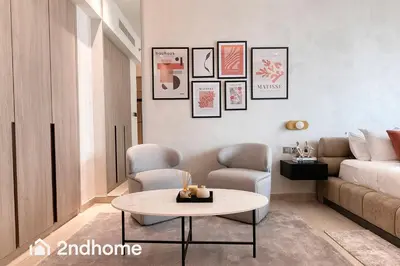 a living room with a couch and a table at 2ndHome - Me Do Re , Cluster L, JLT in Dubai