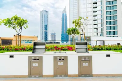 a counter with four pay phones in a city at Burj Crown - Downtown Elegance Opera Boulevard View by Dubai Mall in Dubai