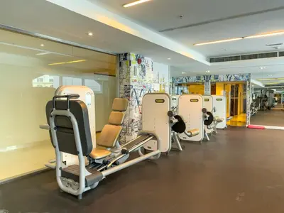 a row of empty chairs in a gym at Maison Privee - Cosmopolitan Apt with Scenic Dubai Marina Vws in Dubai