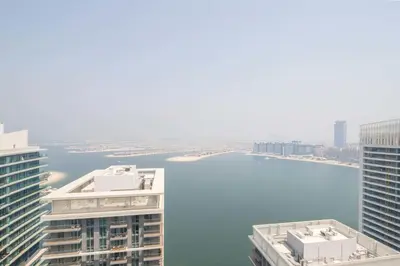 an aerial view of a body of water between two buildings at Frank Porter - Marina Vista Tower 2 in Dubai