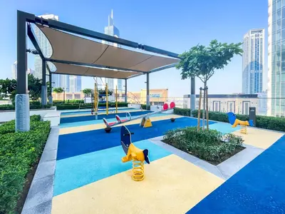 a playground in a city with a view of buildings at Top Floor Home with Amazing City Views 188BC-2 in Dubai