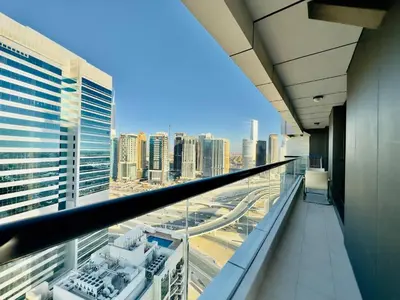 a view of the city from a high rise building at Sea Front Living, Upgraded 2BR Apartment, Escan Tower, Dubai Marina in Dubai
