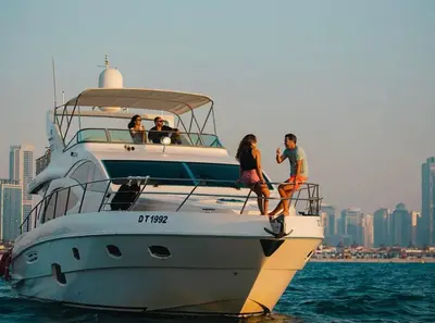 a group of people on a boat in the water at Hospitality Expert 7 Palm Studio - Beach Pool Bar in Dubai