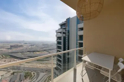 a balcony with a view of a city at What a view - very close to DMCC metro station in Dubai
