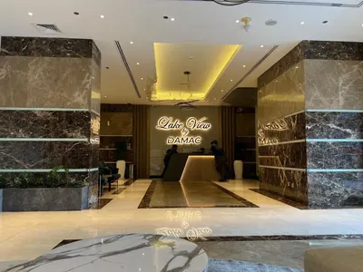 a lobby with a sign that reads little shop dance at What a view - very close to DMCC metro station in Dubai