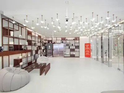 a large room with a chandelier and a lobby at FIRST CLASS Studio Stylish Haven in Dubai
