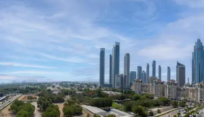 a city skyline with tall skyscrapers in a city at Easy access to Metro - 1BR in Central Park, DIFC - Allsopp&Allsopp in Dubai