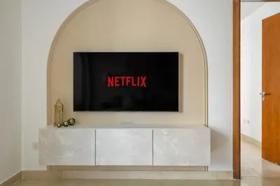an archway with a television on top of a dresser at GuestReady - Stunning hideaway in Dubai Marina in Dubai