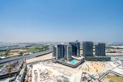 an aerial view of a city with tall buildings at Stunning High Floor Studio Apartment in BusinessBay in Dubai