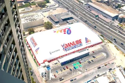 an overhead view of a building in a city with traffic at LUX The Aykon Suite in Dubai