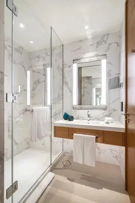 a bathroom with a shower and a sink at Dream Inn - Address Dubai Opera Residences in Dubai