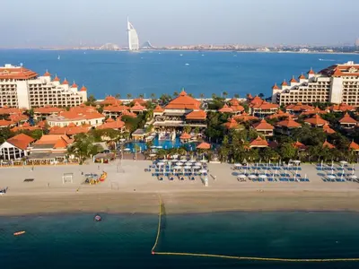 an aerial view of a resort on the beach at Stunning Renovated 1BR Apartment at 5 Star Resort in Dubai